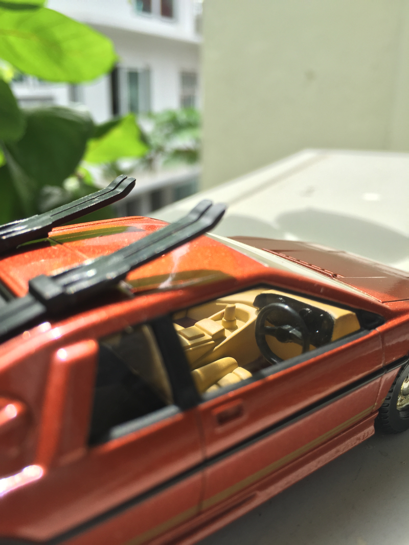Tan and black interior. Not too bad. Love the two spoke Esprit steering wheel!